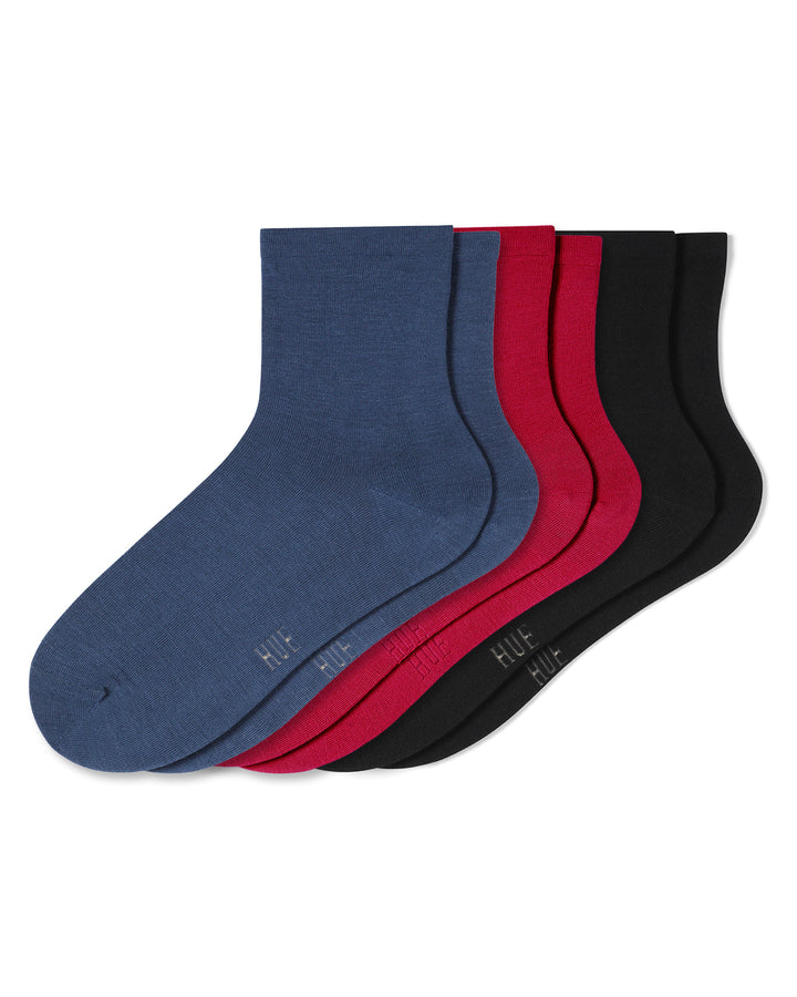 Set of three pairs of socks in blue, red, and black on a white background