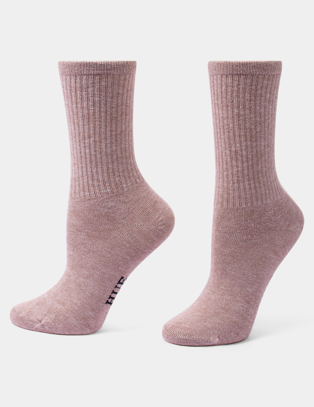 A pair of ribbed crew socks in a dusty mauve-pink color, shown from the side against a light gray background.