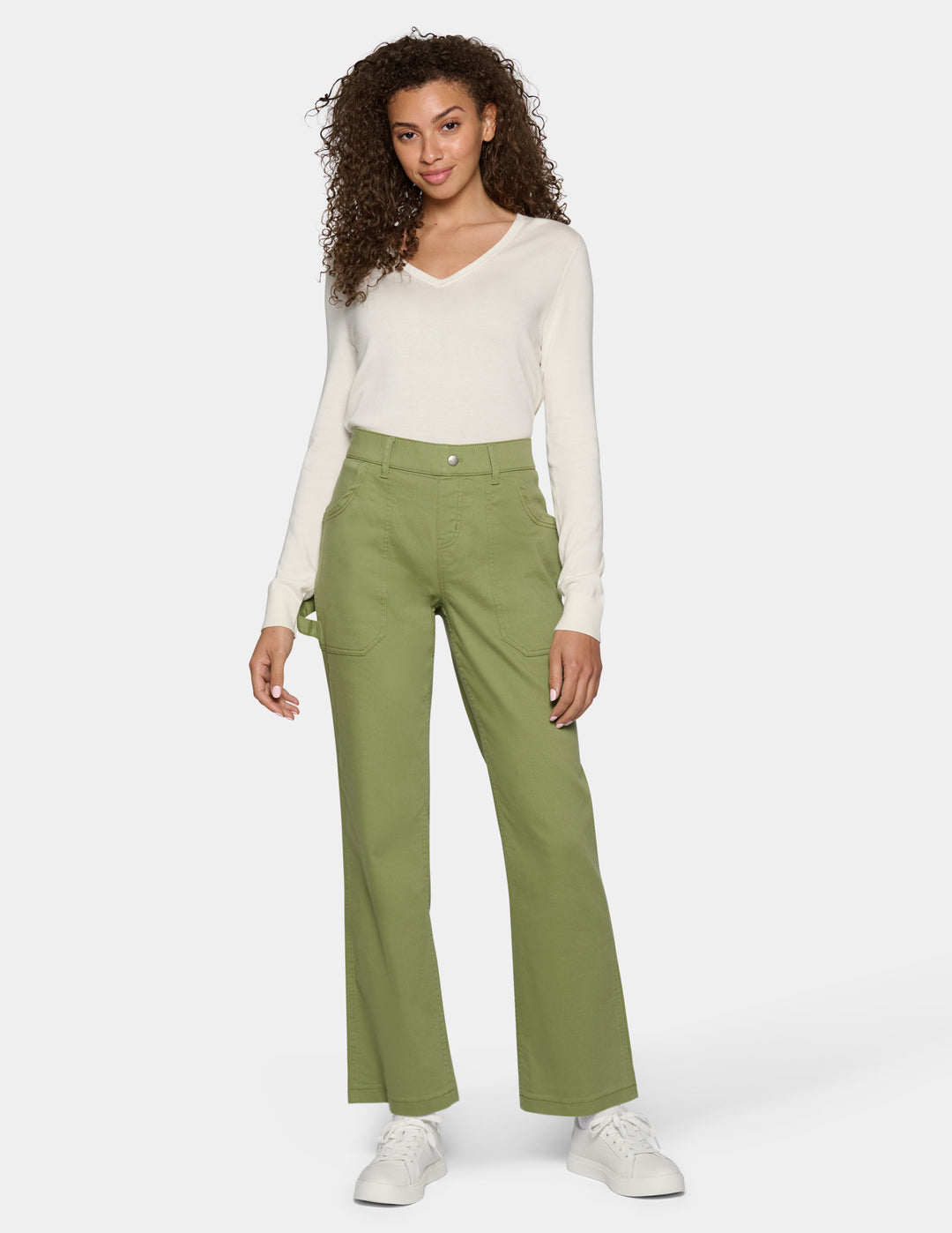 A woman modeling a pair of sage green wide-leg pants 
