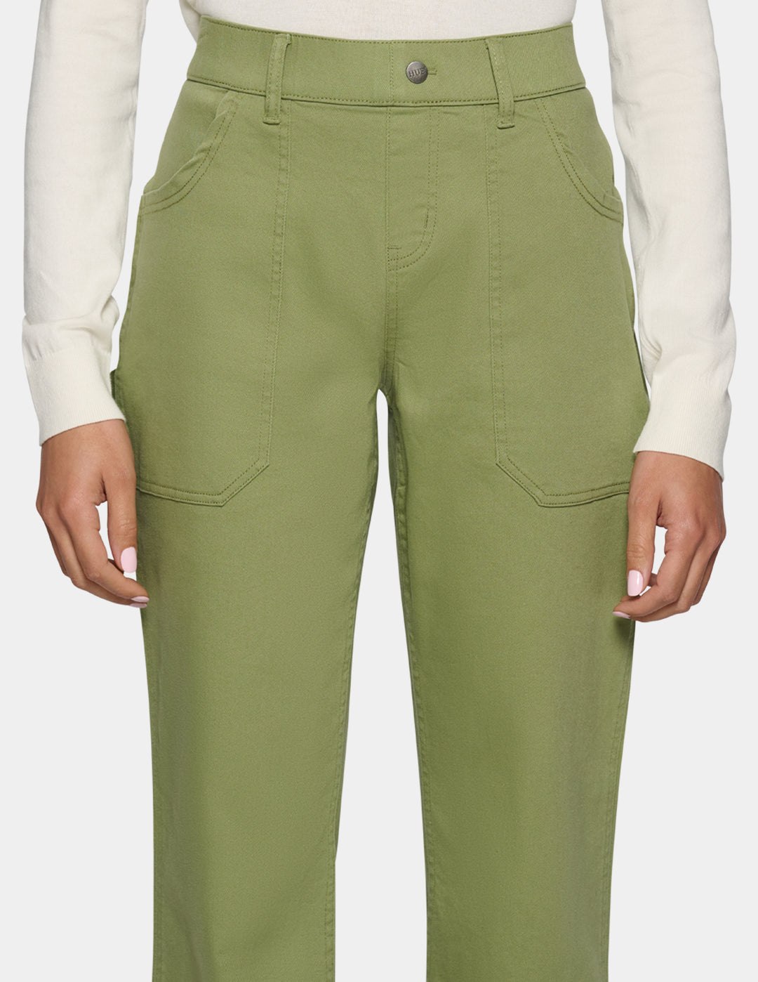 A person wearing olive green high-waisted cargo pants