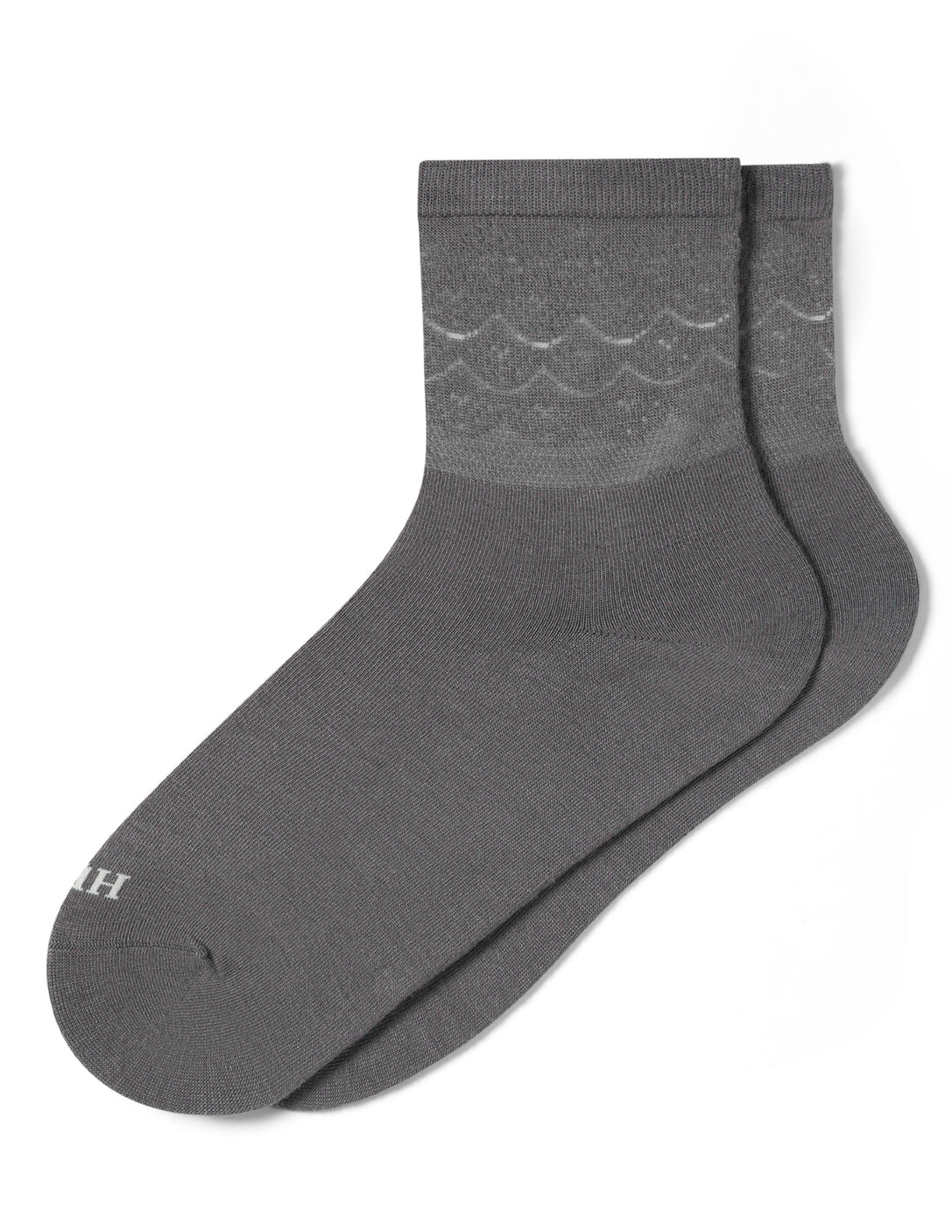 Gray sock with lace pattern on a white background