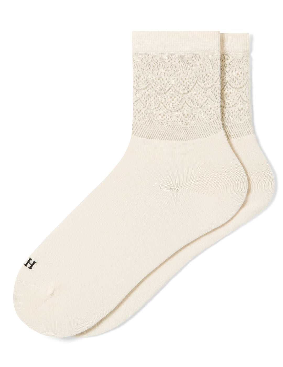 Beige sock with textured pattern on a white background