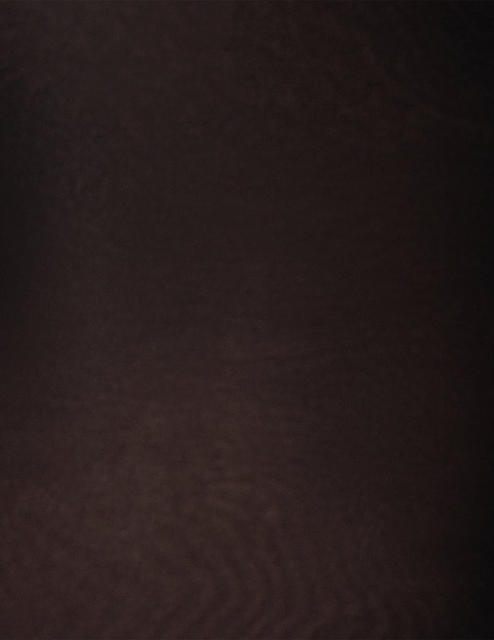 A close-up of a black textured material fabric.
