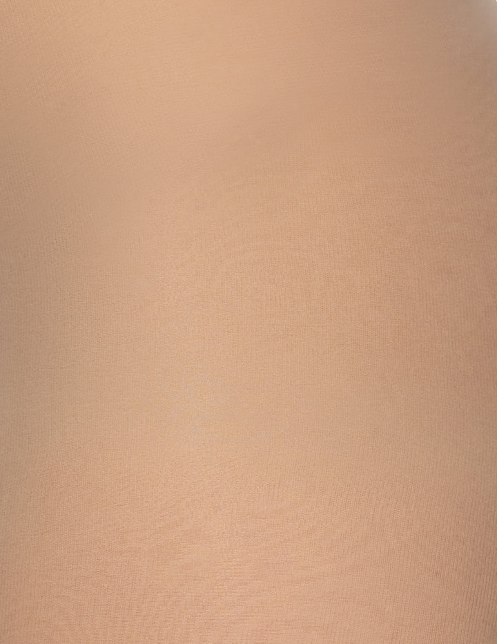 A close-up of a smooth, warm beige textured material fabric.