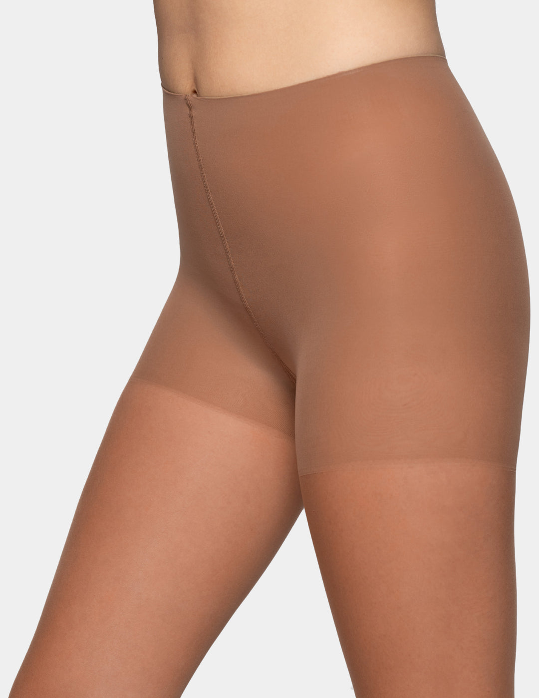 Close-up of a model's hips and upper legs wearing sheer, skin-toned compression hosiery against a light gray background.