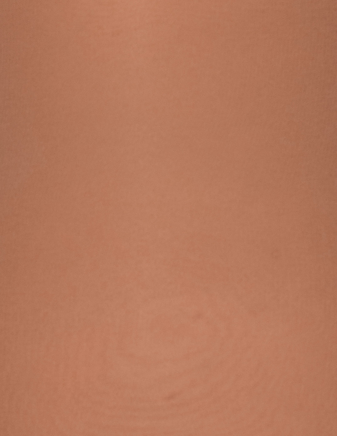 A close-up of a clay-like brown color fabric material.
