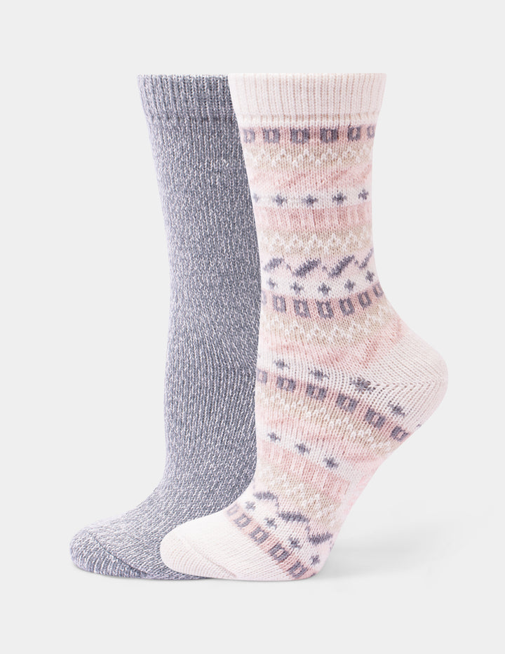 Two pairs of crew socks, one in a ivory and pink color with a geo pattern, and the other in a plain heather grey, against a light gray background.