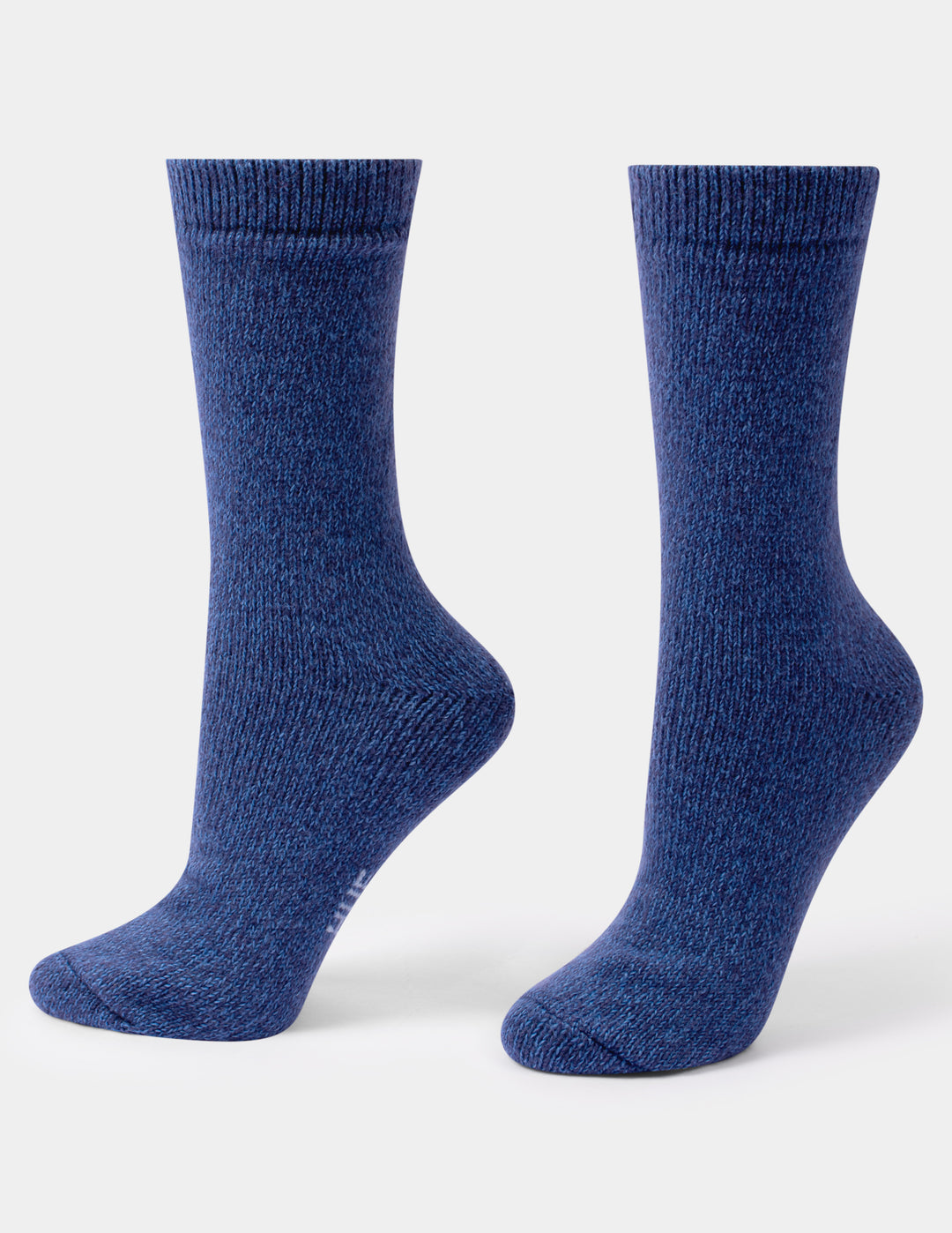 A pair of blue crew socks against a light gray background.