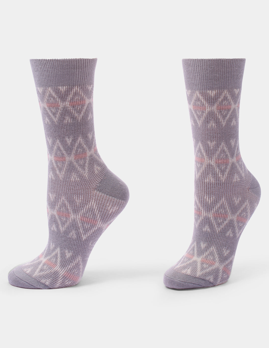 A pair of crew socks in a dusty lavender-gray color, featuring a white geometric diamond pattern with thin coral-pink accent lines, shown against a plain white background.