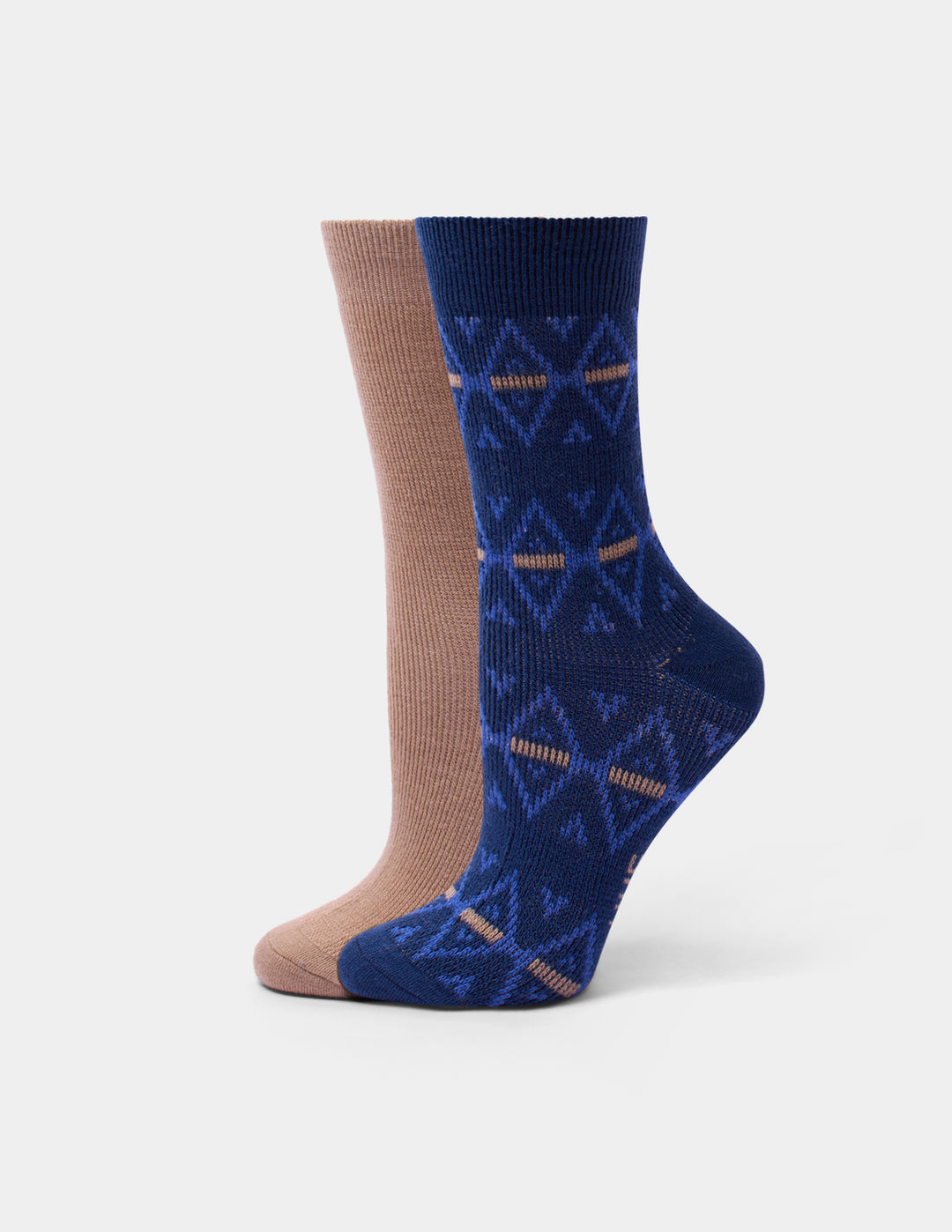 Two crew socks shown on invisible forms against a light gray background. The front sock is dark blue with a geometric pattern in medium blue and tan, and the back sock is a solid tan color.