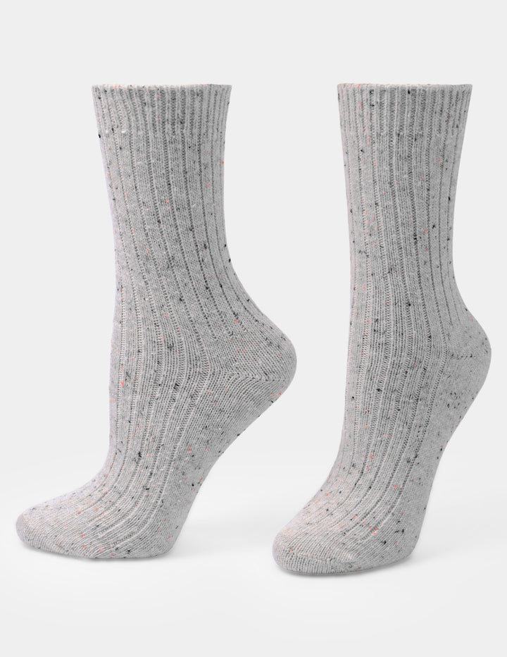 A pair of light gray ribbed crew socks with small multicolor speckles, displayed on a clean white background.