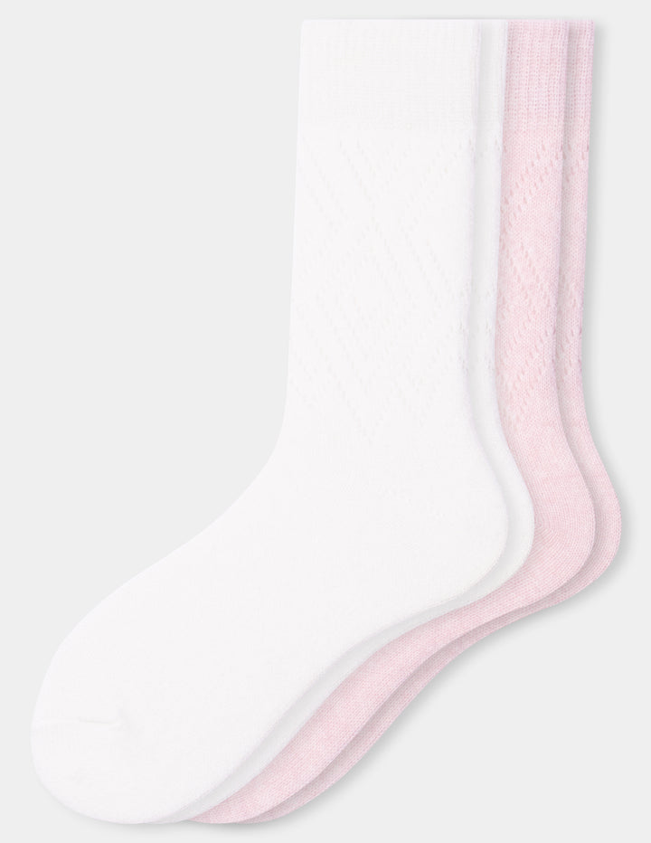 Two crew socks in white and light pink, arranged in a fan shape against a light gray background.