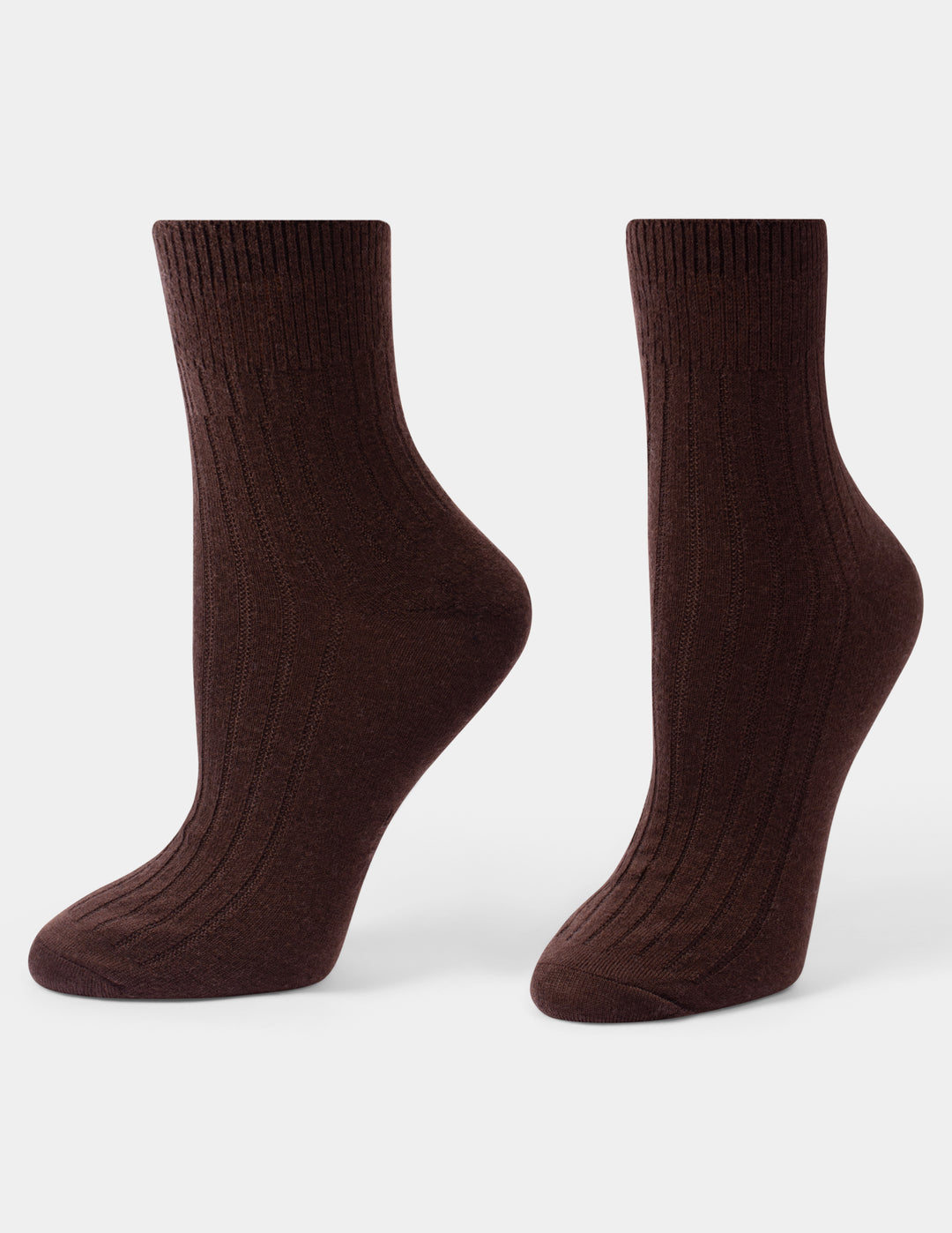 A pair of dark brown ribbed crew socks displayed on invisible forms against a light gray background.