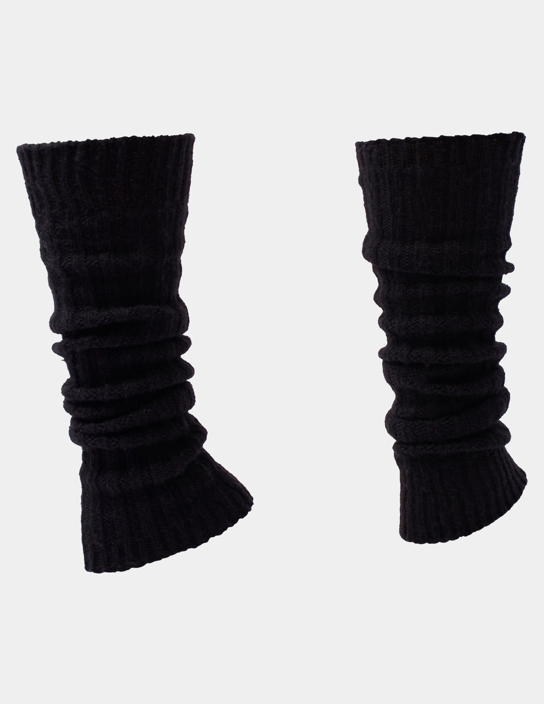 Ribbed black leg warmers photographed against a light gray background.