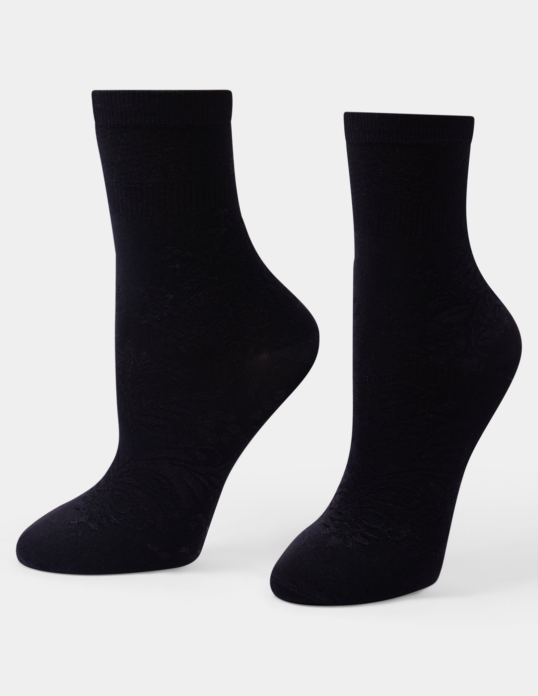 A pair of black crew socks displayed on foot forms against a light gray background.