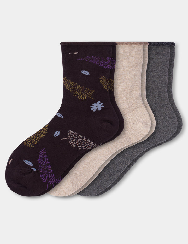 Three pairs of crew socks on a white background. 