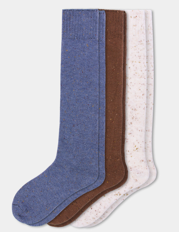 Three pairs of tall socks in heathered blue, brown, and off-white with small tan speckles, arranged overlapping on a light gray background.