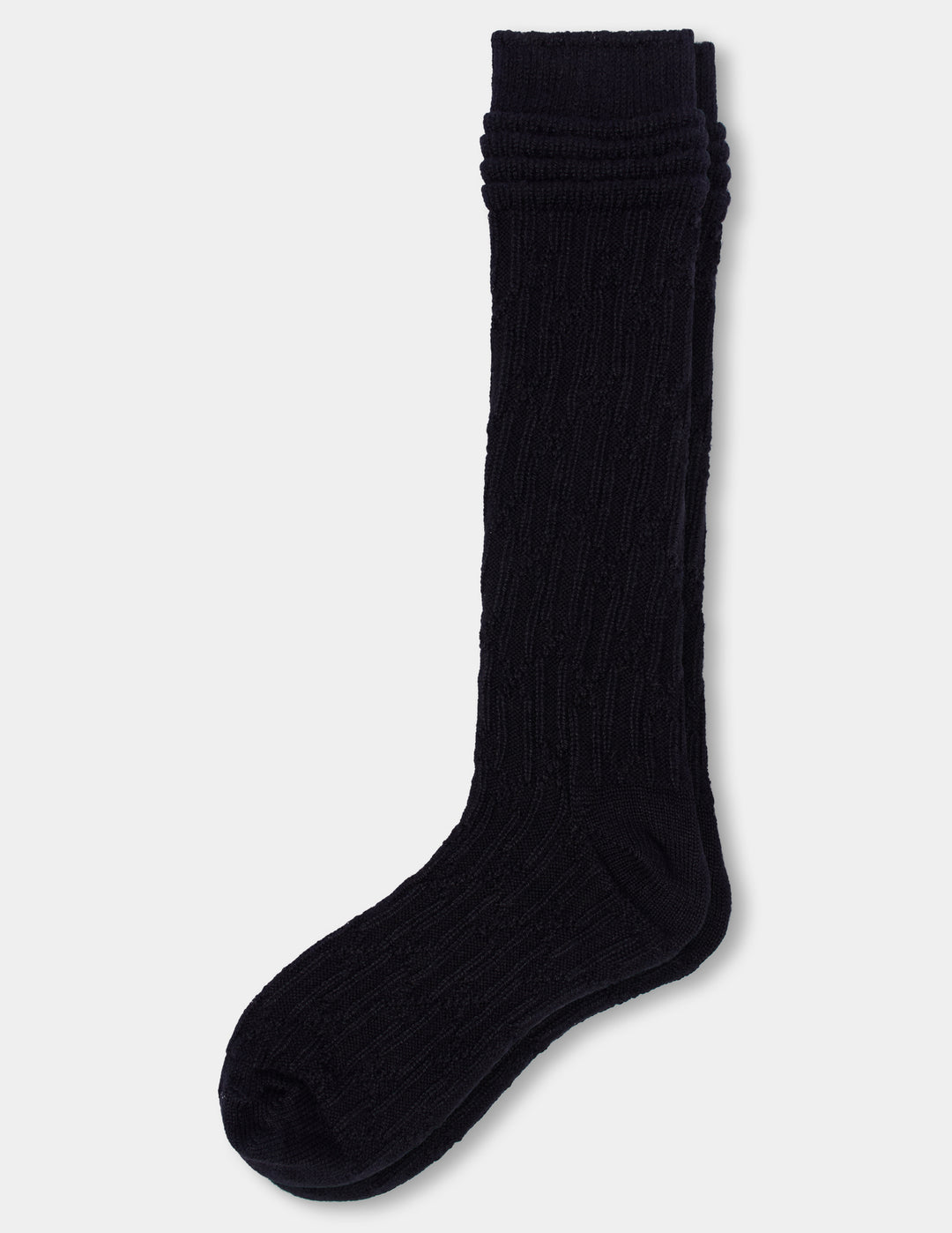 A pair of black cable knee socks against a light gray background. 