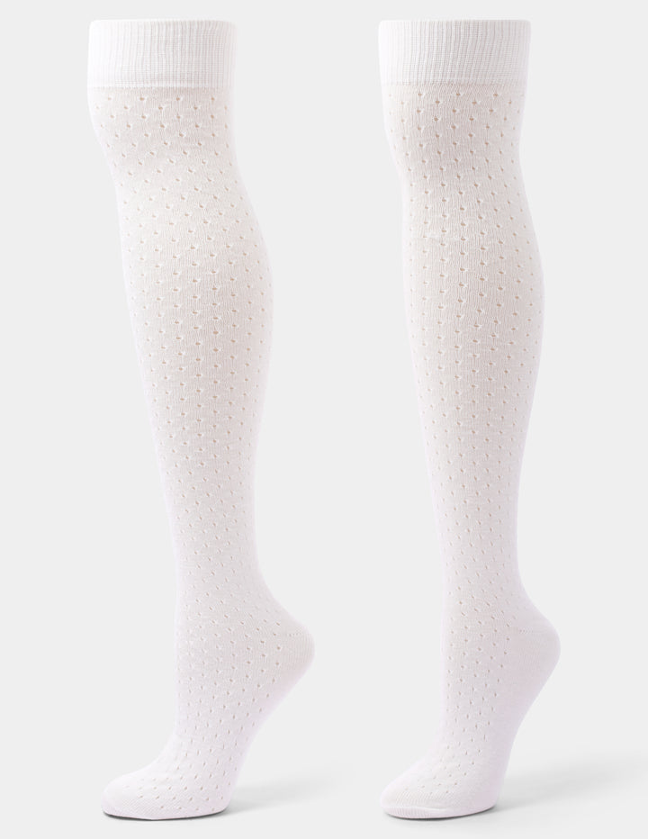 A pair of ivory over-the-knee socks with a textured, dotted knit pattern, displayed on invisible forms against a light gray background.