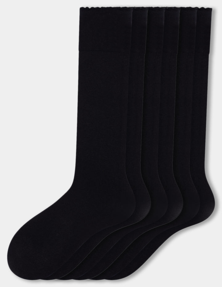 Three pairs of knee-high socks fanned out against a light gray background.