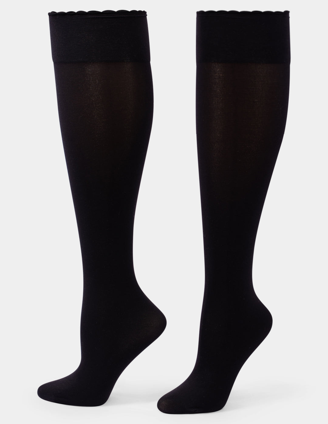 A pair of black over-the-knee sheer socks with solid black cuffs, shown on a light gray background.