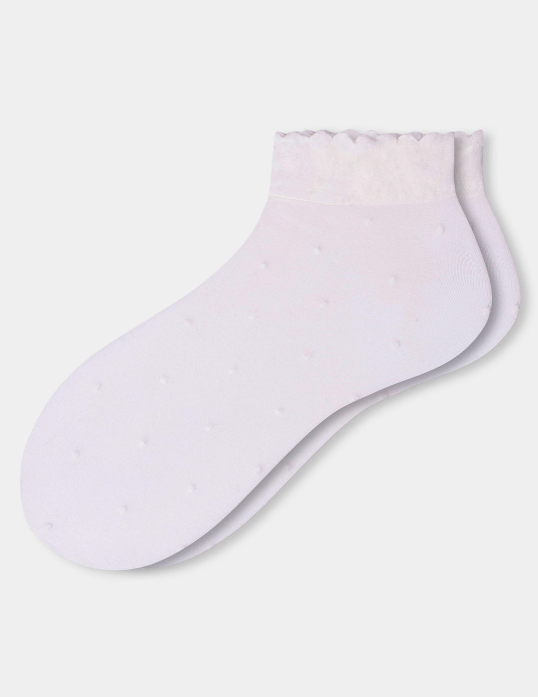 A pair of ivory ankle socks with a textured, dotted pattern and a ruffled trim at the top, displayed against a light gray background.