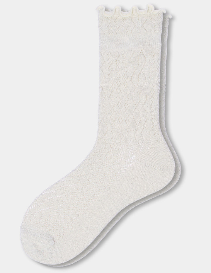Ivory crew socks with a ruffle edge displayed against a light grey background.