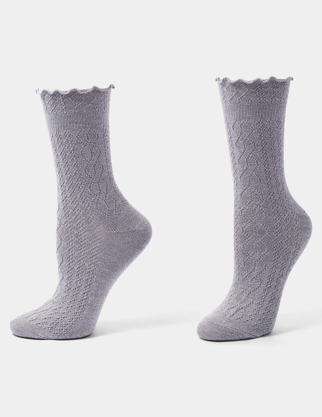Grey crew socks with a ruffled edge photographed against a light gray background.