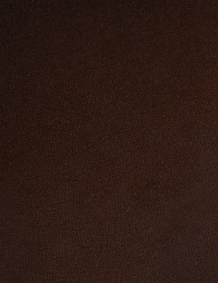 A close-up of a dark brown textured fabric surface.