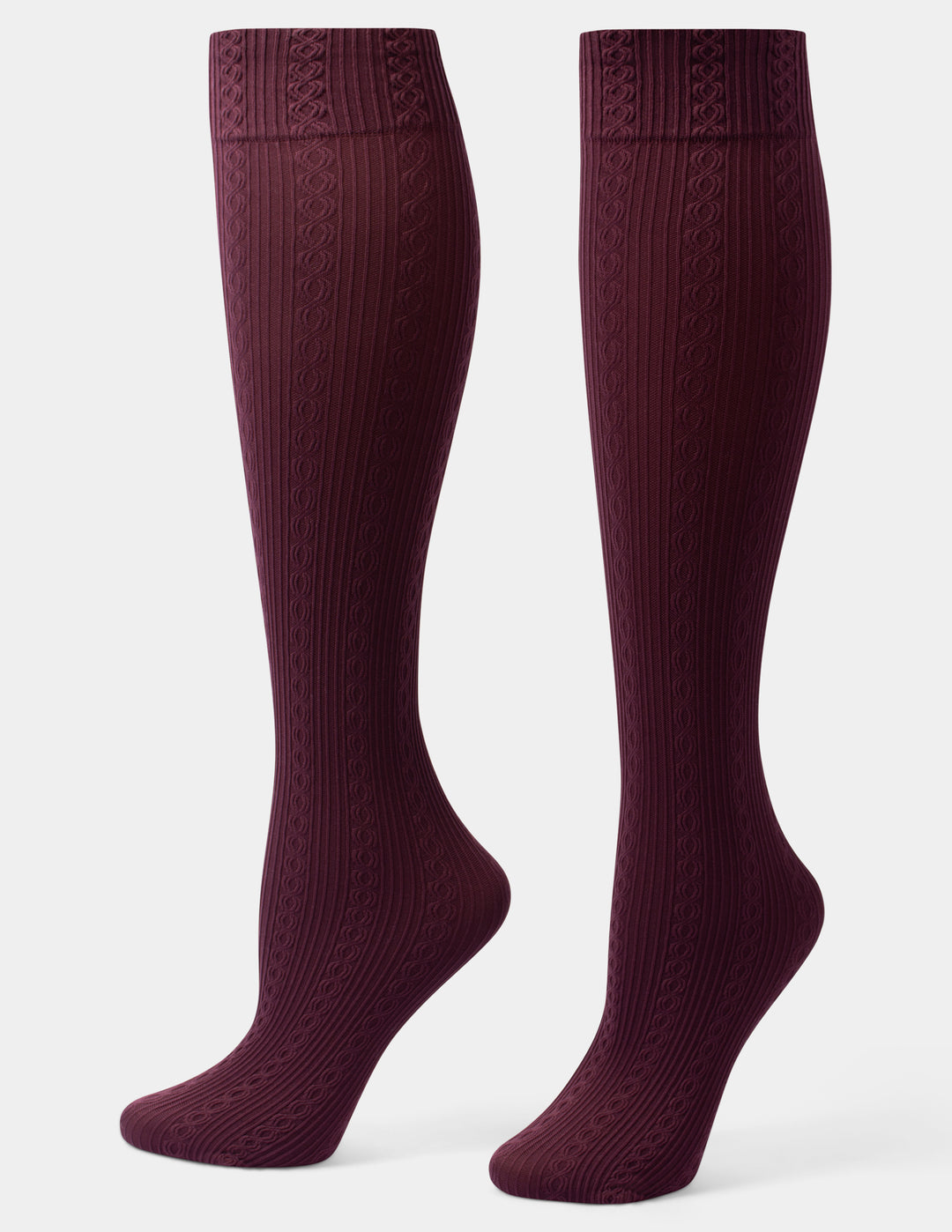 A pair of ribbed knee high socks in a deep burgundy color, displayed against a light gray background.