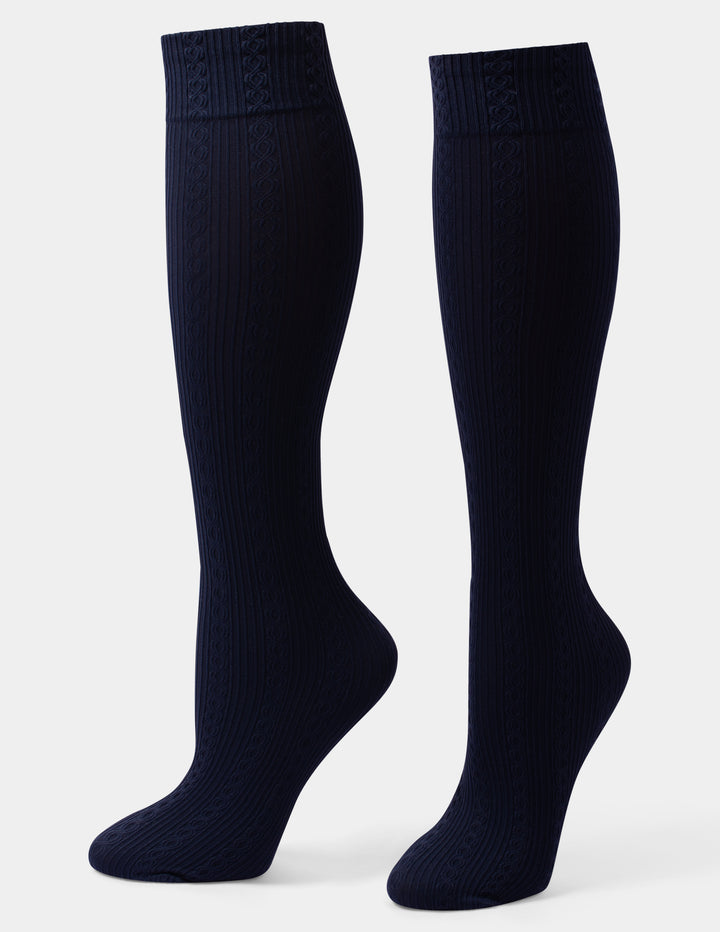 A pair of dark navy blue ribbed knee-high socks shown on leg forms against a light gray background.