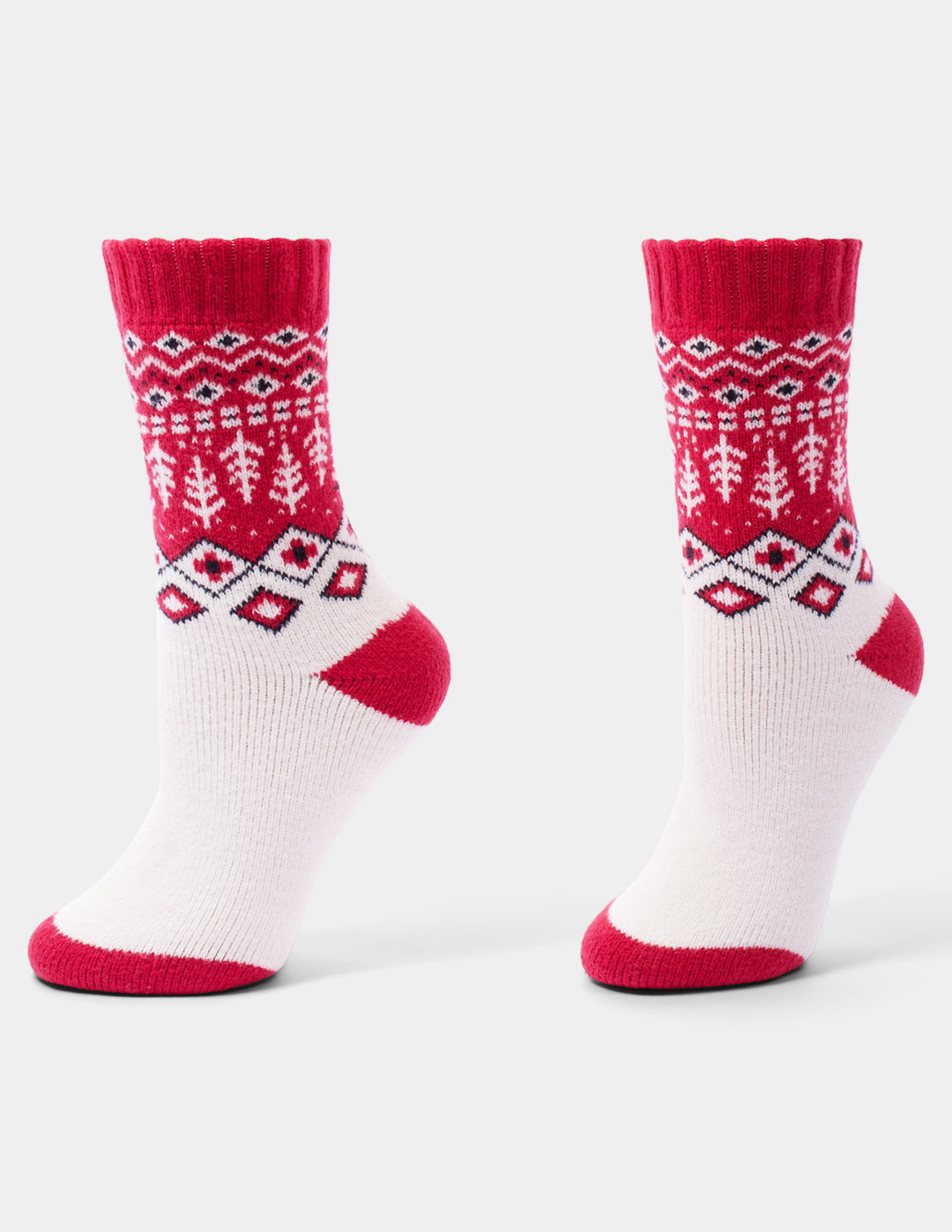 A pair of red and white holiday pattern crew socks displayed against a light grey background.