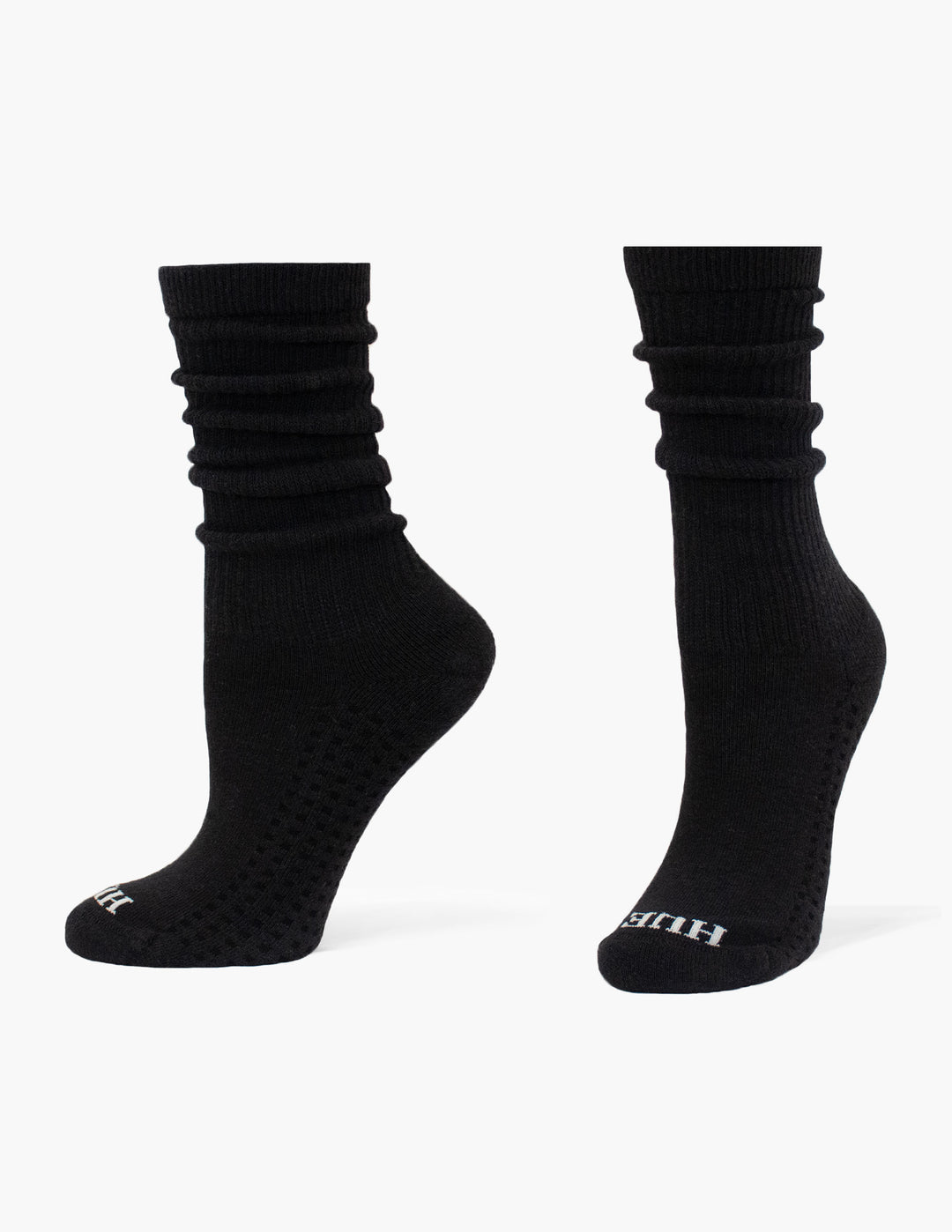 Pair of black socks on a white background