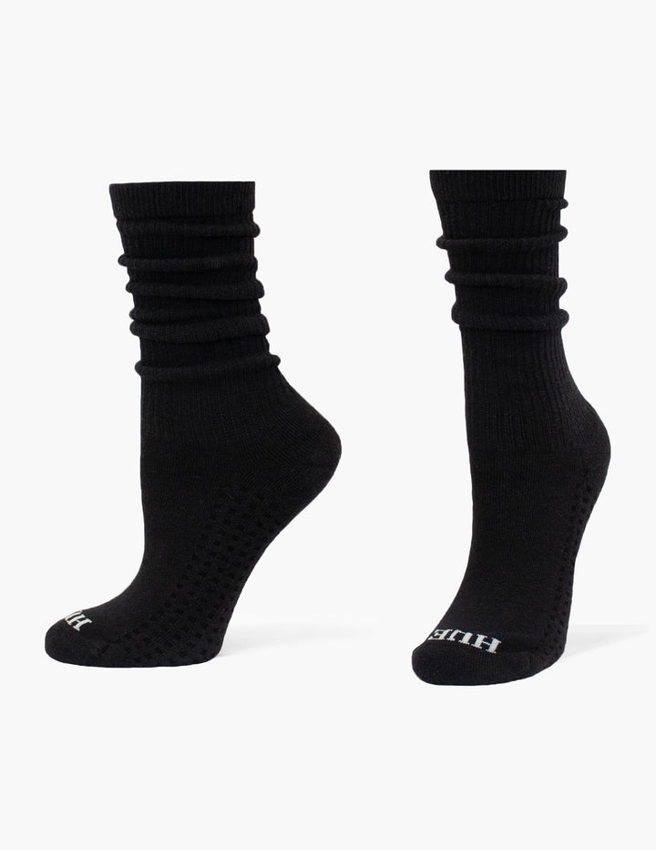 Pair of black socks on a white background