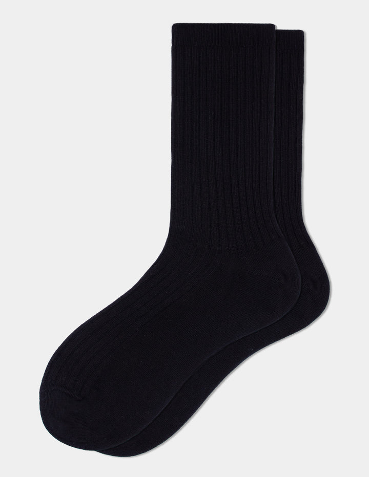 A pair of black crew socks displayed against a light gray background.