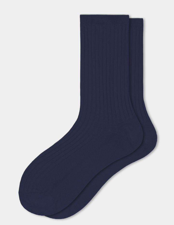 A navy pair of ribbed crew socks displayed against a light gray background.