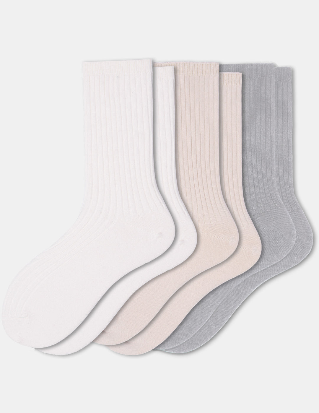 Three pairs of crew socks in ivory, beige, and light grey displayed against a light gray background.