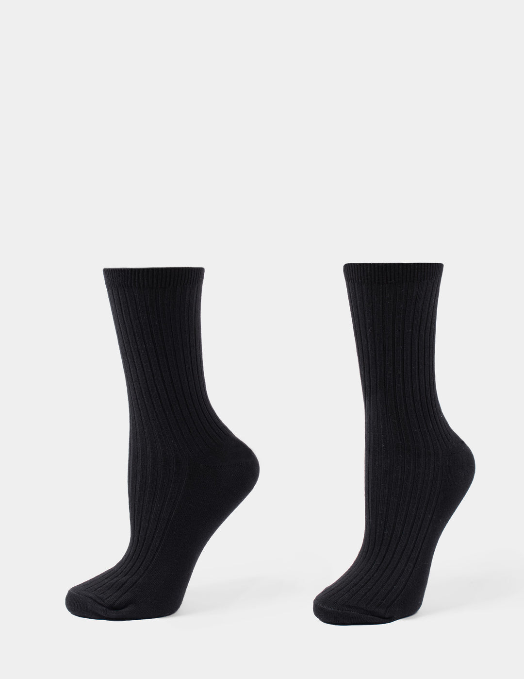 A pair of black crew socks displayed against a light gray background.