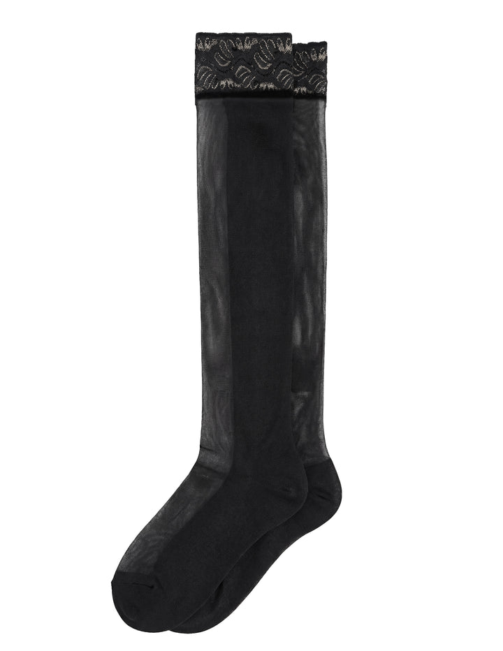 Black thigh-high sheer stocking with lace trim on a white background