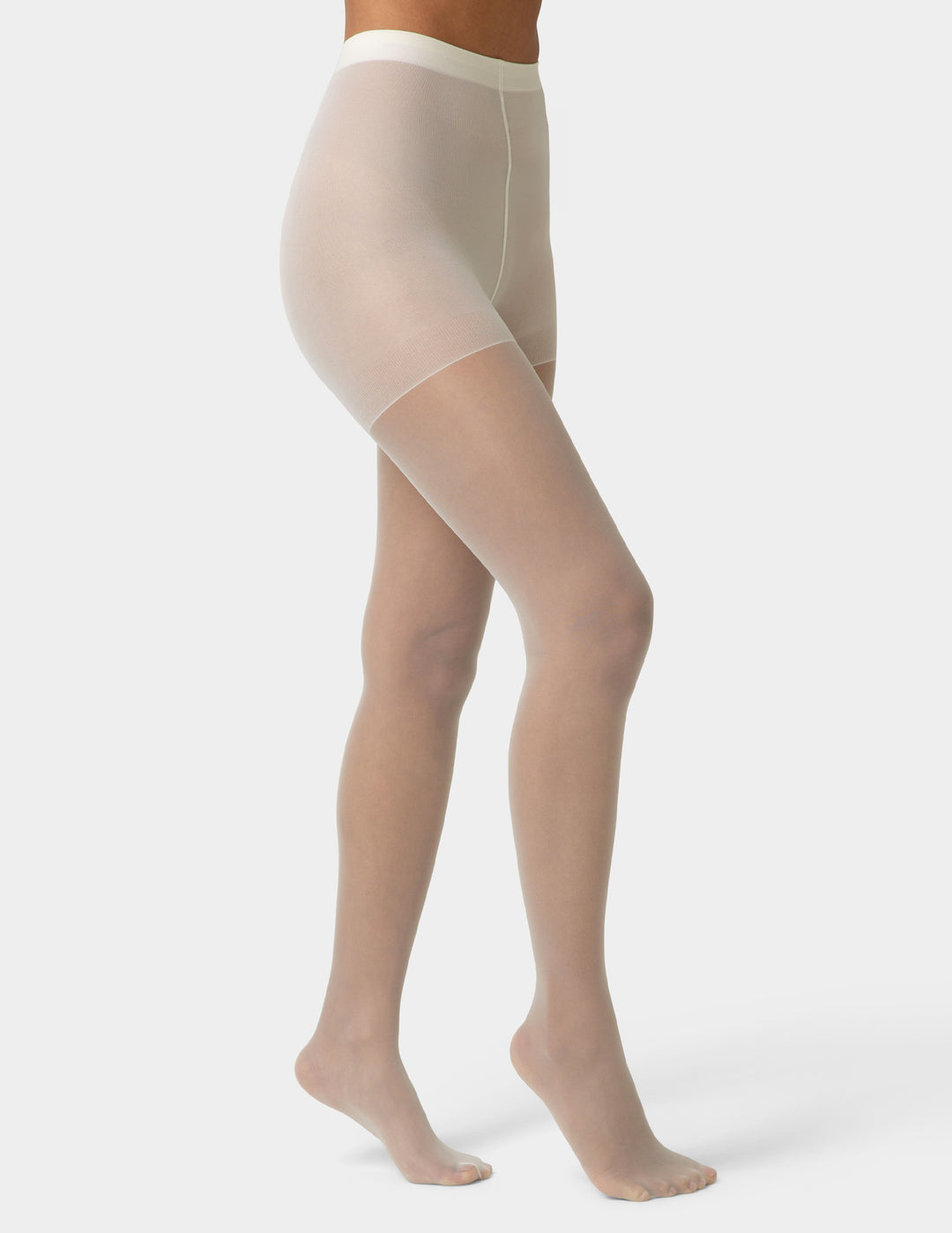 Beige sheer tights worn by a person on a white background