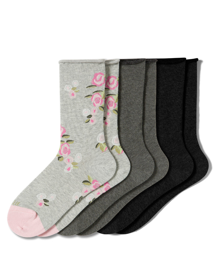 Set of socks with floral design on gray background