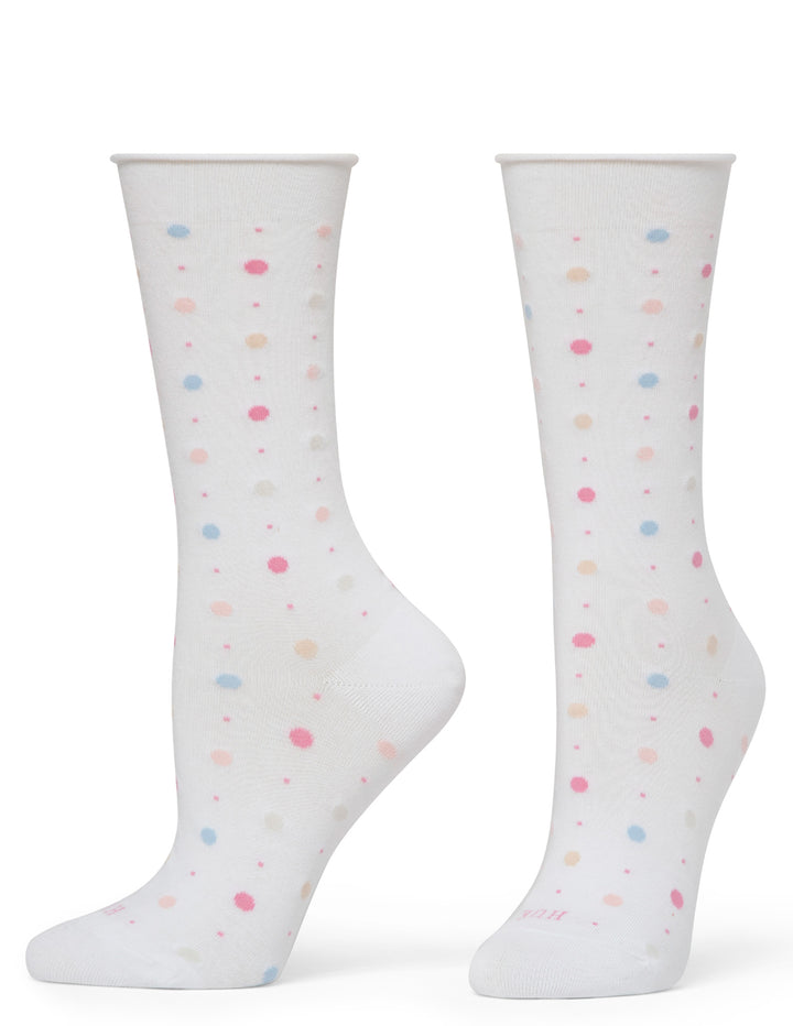 White socks with colorful polka dots on a white background