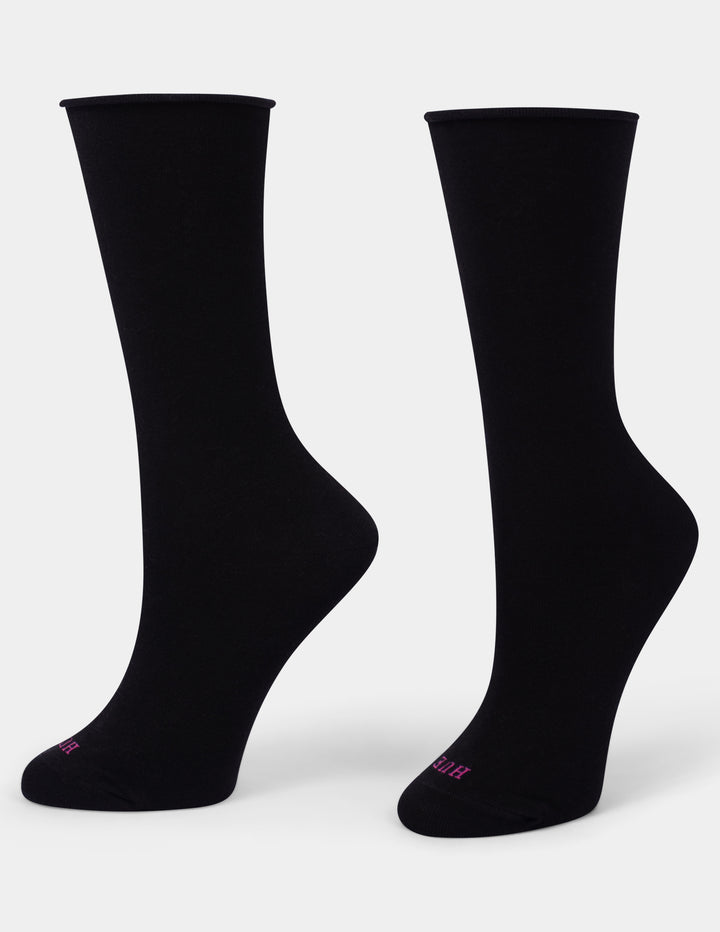 A pair of black crew socks displayed on foot forms against a light gray background, with a small pink logo on the toe area.