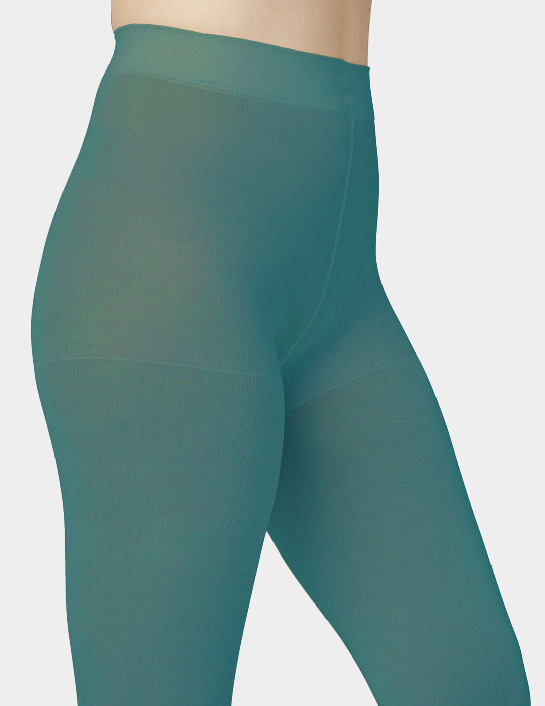 Close-up of a person wearing high-waisted teal tights against a light gray background.