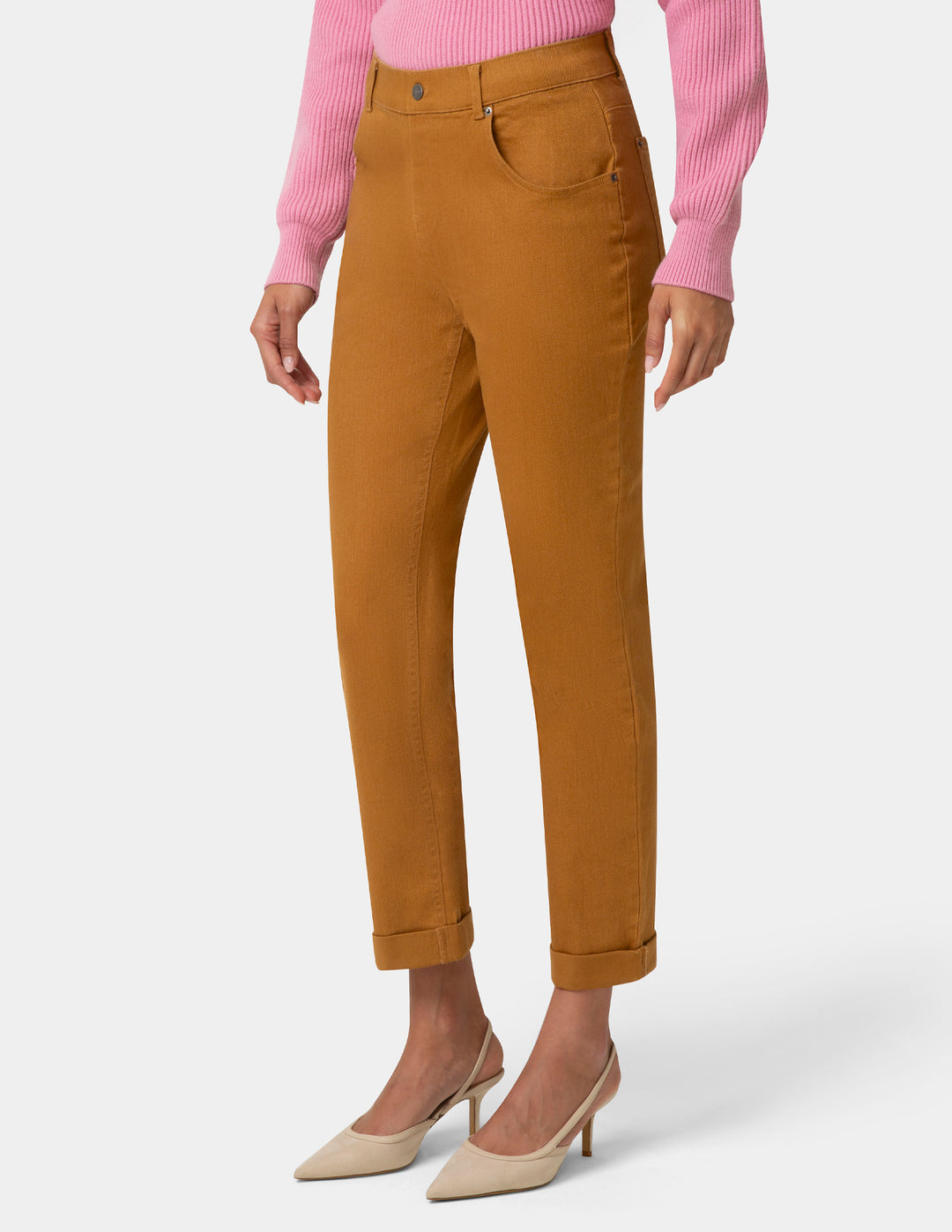 Brown pants worn by a person on a white background