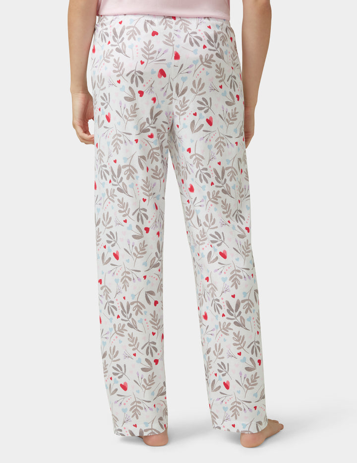 Floral patterned pajama pants on a white background