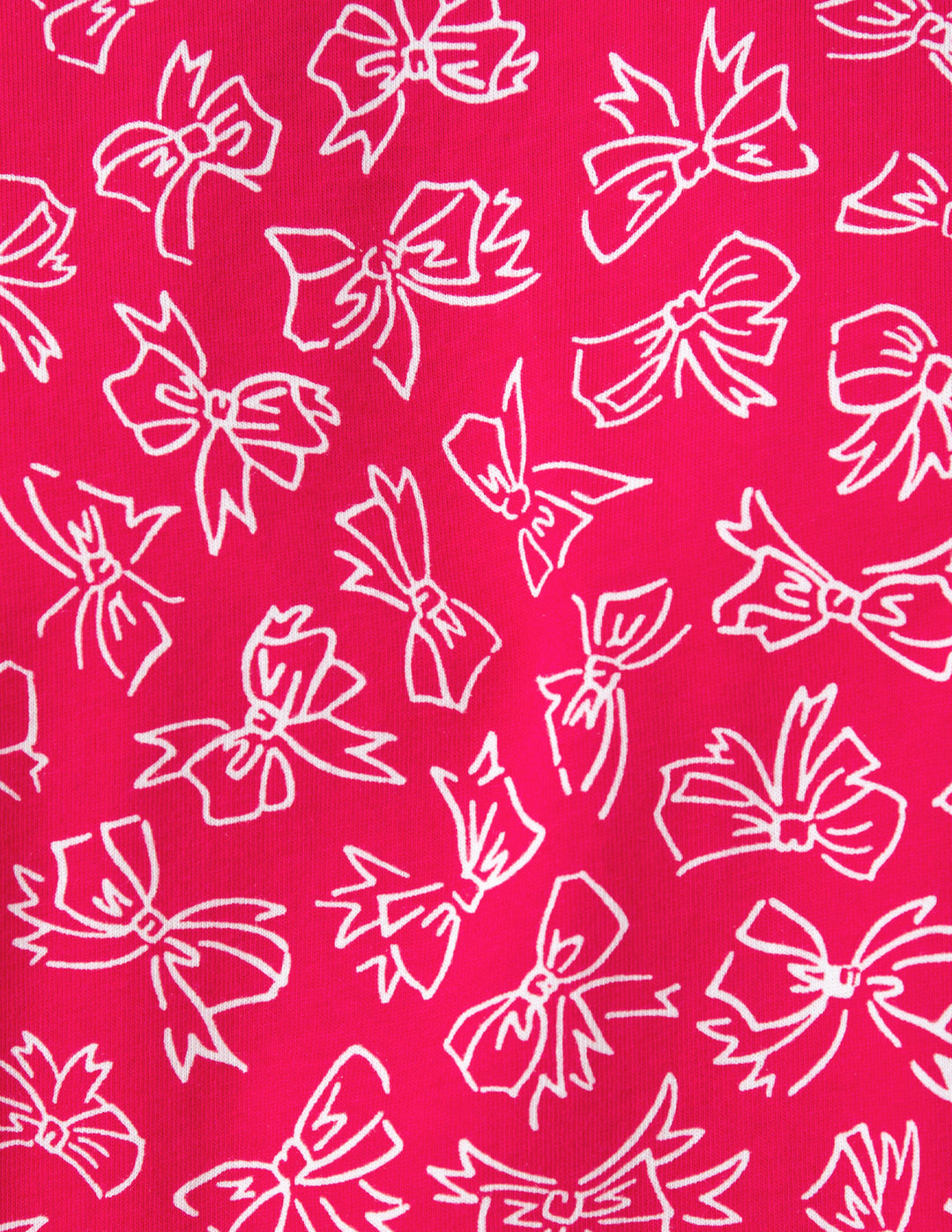 White bows pattern on a pink background