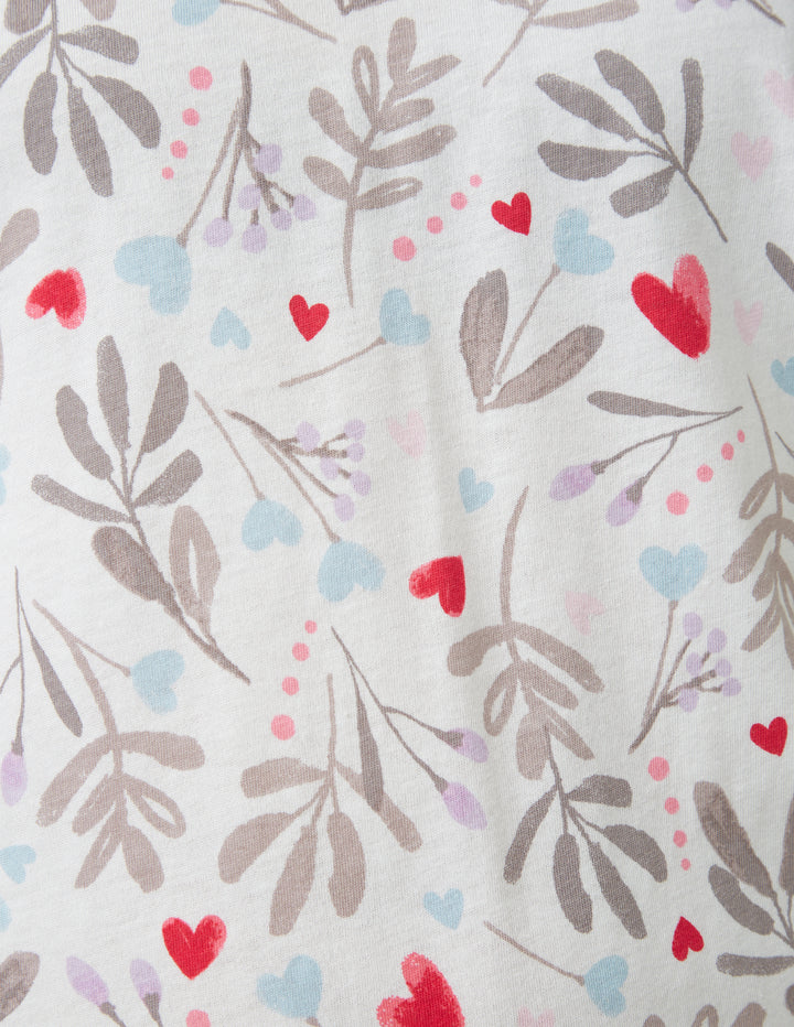 Heart and floral detail on a white background