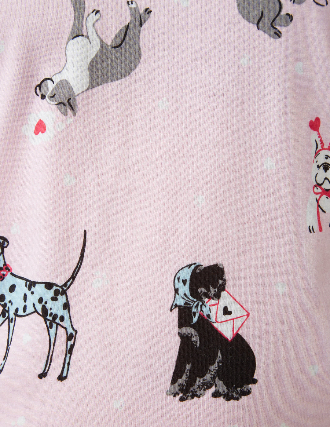 Light pink background with dog print details