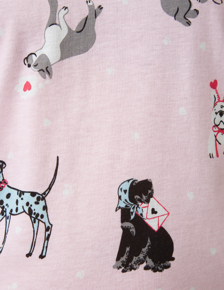 Light pink background with dog print details